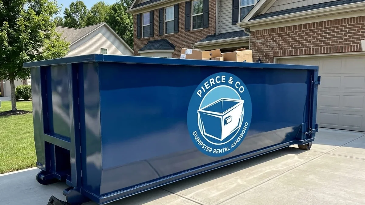 Pierce & Co Dumpster Rental Asheboro roll-off truck delivering in Asheboro, NC